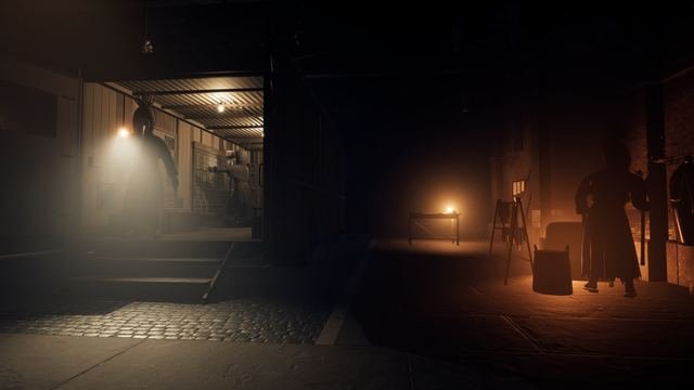 In-game, the garage: a crewmate at the kit rack in the van's lit rear, and another in the coach house's stove-lit corner.